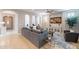 Bright and airy living room featuring a neutral color palette and arched doorways at 37148 N Stoneware Dr, Queen Creek, AZ 85140