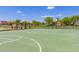 Community basketball court with shaded seating area and neighborhood homes in the background at 3848 S Coach House Dr, Gilbert, AZ 85297