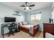 Bright bedroom with a window, desk, closet, and carpet flooring, providing a functional and comfortable space at 3848 S Coach House Dr, Gilbert, AZ 85297