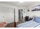 Comfortable bedroom featuring carpet, large closet, and access to the bathroom, creating a functional and inviting space at 3848 S Coach House Dr, Gilbert, AZ 85297