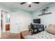 Light blue bedroom featuring a desk, closet, carpet flooring, and an ensuite bathroom at 3848 S Coach House Dr, Gilbert, AZ 85297