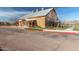 View of the clubhouse exterior displaying the address and fire lane in front of building at 3848 S Coach House Dr, Gilbert, AZ 85297