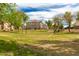 Well-maintained community volleyball court surrounded by green space and residential buildings at 3848 S Coach House Dr, Gilbert, AZ 85297