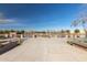 Lake view featuring walking paths, lush trees and serene water at 3848 S Coach House Dr, Gilbert, AZ 85297