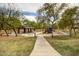 Enjoy a walking path through the community park with playgrounds and a pavilion for residents at 3848 S Coach House Dr, Gilbert, AZ 85297