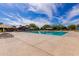 Large community pool with ample deck space for lounging and relaxation at 3848 S Coach House Dr, Gilbert, AZ 85297
