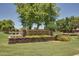 Welcoming stone sign for Ranch House Clubhouse & Park enhances the community’s curb appeal and sense of place at 3848 S Coach House Dr, Gilbert, AZ 85297