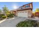 Beautiful two-story home boasts a welcoming entrance, manicured landscape, and a two-car garage at 3848 S Coach House Dr, Gilbert, AZ 85297