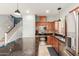 A cozy kitchen boasts stainless steel appliances and a breakfast bar at 3848 S Coach House Dr, Gilbert, AZ 85297