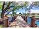 Scenic view of the wooden pier and lake, perfect for an evening stroll at 3848 S Coach House Dr, Gilbert, AZ 85297