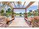 Enjoy serene lake views from the community pergola with built-in seating at 3848 S Coach House Dr, Gilbert, AZ 85297