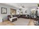 Comfortable living room with tile floors, natural light and sectional sofa at 3848 S Coach House Dr, Gilbert, AZ 85297