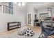 Bright living room features high ceilings, neutral walls, tiled floors, and natural light at 3848 S Coach House Dr, Gilbert, AZ 85297