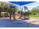 A fun playground with a slide and climbing features is perfect for play at 3848 S Coach House Dr, Gilbert, AZ 85297
