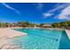 A beautifully maintained outdoor pool perfect for swimming laps on a sunny day in a well-amenitized community at 3848 S Coach House Dr, Gilbert, AZ 85297