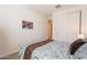 Cozy bedroom featuring a neutral color scheme, soft carpet, and convenient closet storage at 4077 S Sabrina Dr # 25, Chandler, AZ 85248