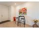 Inviting entryway featuring modern table and stools, stylish artwork, and ample space at 4077 S Sabrina Dr # 25, Chandler, AZ 85248