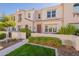 Charming two-story home with well-maintained landscaping and a welcoming gated entrance at 4077 S Sabrina Dr # 25, Chandler, AZ 85248