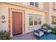 Cozy front porch with seating, decorative tiles, and a welcoming entrance at 4077 S Sabrina Dr # 25, Chandler, AZ 85248