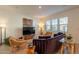 Bright living room with modern furnishings, sleek TV, and large windows at 4077 S Sabrina Dr # 25, Chandler, AZ 85248