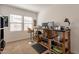Well-lit home office with two windows, providing a comfortable workspace at 4077 S Sabrina Dr # 25, Chandler, AZ 85248