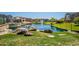 Community pond featuring lush grass, fountain, and rock details at 4077 S Sabrina Dr # 25, Chandler, AZ 85248