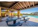 Community pool with a covered pavilion and picnic tables at 4077 S Sabrina Dr # 25, Chandler, AZ 85248