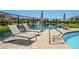 Community pool and sun deck featuring comfortable lounge chairs at 4077 S Sabrina Dr # 25, Chandler, AZ 85248