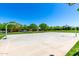 Community basketball court with green surroundings, offering a space for sports and recreation at 4167 E Sierra Madre Ave, Gilbert, AZ 85296