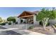 Welcoming clubhouse entrance with desert landscaping at 4202 E Broadway Rd # 126, Mesa, AZ 85206