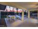 Covered patio with a stunning view of the backyard, pool, and twilight sky at 4228 N 87Th St, Scottsdale, AZ 85251