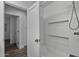 This bathroom features a white shower tub and an adjacent white door at 4228 N 87Th St, Scottsdale, AZ 85251