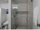The shower features a glass enclosure, rain shower head, and tile surround at 4228 N 87Th St, Scottsdale, AZ 85251