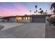 Charming single-story home boasts a wide driveway, two car garage, and large front windows at 4228 N 87Th St, Scottsdale, AZ 85251