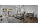 Inviting living room features modern decor, wood floors, and access to the backyard at 4228 N 87Th St, Scottsdale, AZ 85251