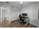 Bright home office with modern desk, and hardwood floors at 4228 N 87Th St, Scottsdale, AZ 85251