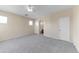 Spacious bedroom with ensuite bathroom, ceiling fan, and neutral tones at 4234 S 62Nd Ln, Phoenix, AZ 85043