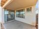 Covered patio with concrete flooring, windows, and sliding glass door to inside at 4234 S 62Nd Ln, Phoenix, AZ 85043