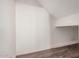 Finished attic space showcasing built in shelving at 439 N Cobblestone St, Gilbert, AZ 85234