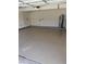 Spacious garage with epoxy floors and water heater hookup at 439 N Cobblestone St, Gilbert, AZ 85234