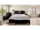 Bedroom with a full bed frame, wood flooring, and plenty of natural light at 4604 E Summerhaven Dr, Phoenix, AZ 85044