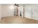 Bright and airy bedroom with carpet flooring, and several doorways leading to closets and a bathroom at 4612 W Waltann W Ln, Glendale, AZ 85306