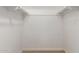 A bright closet offers ample storage space with shelving and rods for organization at 4612 W Waltann W Ln, Glendale, AZ 85306