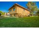 A two-story home with a well-maintained lawn and mature trees in a desirable neighborhood at 4612 W Waltann W Ln, Glendale, AZ 85306