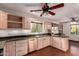 Updated kitchen with stainless steel appliances, granite countertops and custom cabinetry at 4612 W Waltann W Ln, Glendale, AZ 85306