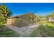 Exterior view of the outbuilding with brick patio at 4612 W Waltann W Ln, Glendale, AZ 85306