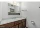 This bathroom features a vanity with storage and a mirrored medicine cabinet at 4728 N 61St Ave, Phoenix, AZ 85033