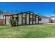 Charming single-story home featuring a well-maintained front lawn and a two-car garage at 4728 N 61St Ave, Phoenix, AZ 85033