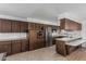 Kitchen featuring stainless steel appliances, ample counter space, and wood cabinetry at 4728 N 61St Ave, Phoenix, AZ 85033