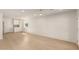 Bright and airy living room with pristine white walls and stylish light wood flooring at 4901 W Augusta Cir, Glendale, AZ 85308
